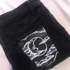 Hand painted black ripped jeans